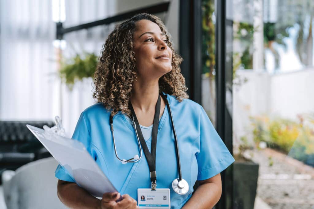 nurse looking out window