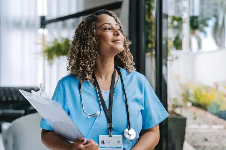 nurse looking out window