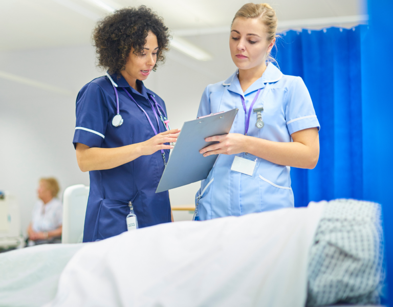 two nurses talking